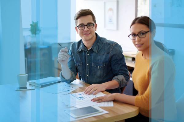 Man and woman in a 360 feedback session