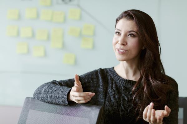 Woman talking during an interview