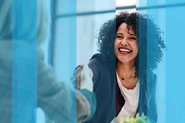 Successful candidate smiles in interview